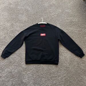Black Crewneck Sweater with Red Accent